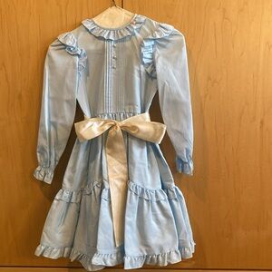 Light Blue Ruffled Dress with White Bow